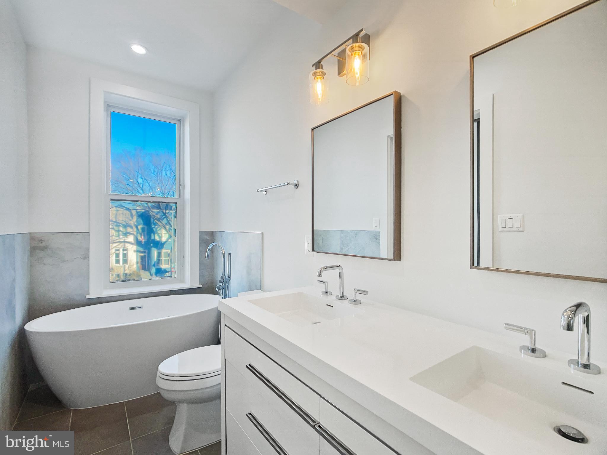 2228 13th Street Northwest, Unit 3 Washington, DC 20009 - Photo 19 of 44 Modern bathroom with elegant fixtures.
