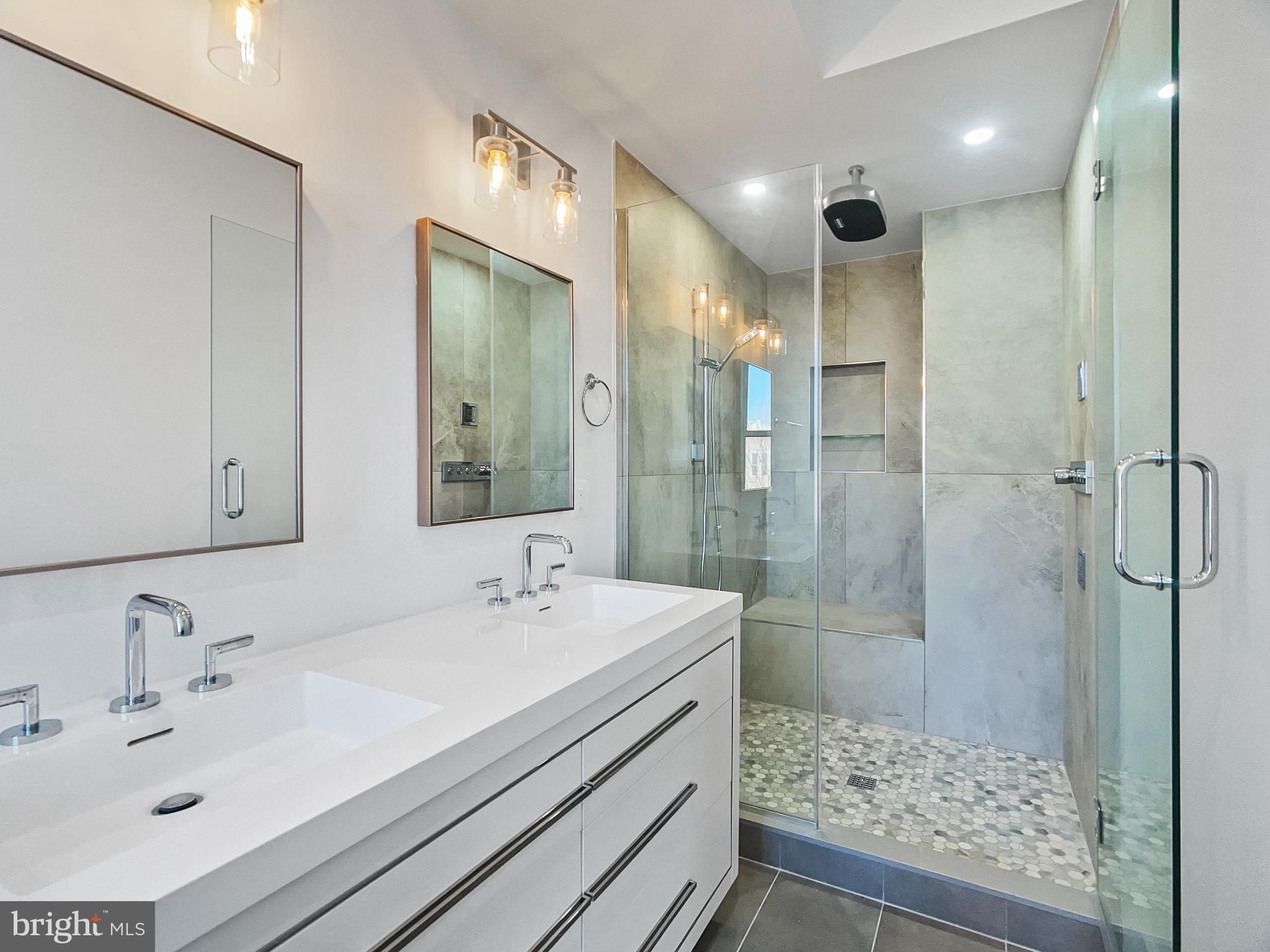2228 13th Street Northwest, Unit 3 Washington, DC 20009 - Photo 21 of 44 Sleek modern bathroom with elegant finishes.