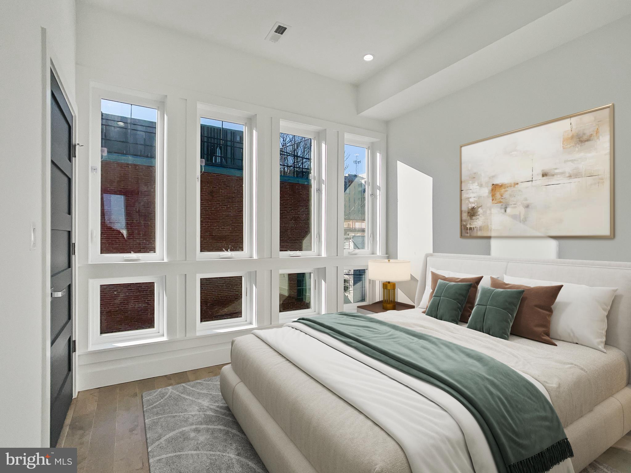 2228 13th Street Northwest, Unit 3 Washington, DC 20009 - Photo 29 of 44 Bright and airy bedroom with large windows.