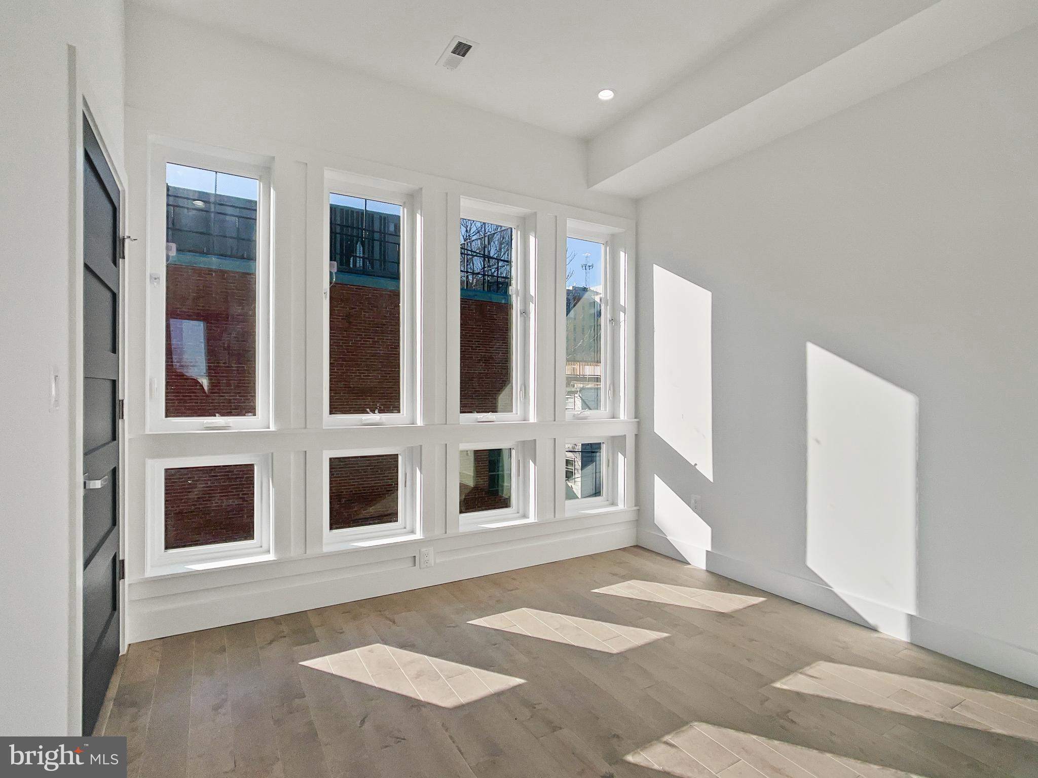 2228 13th Street Northwest, Unit 3 Washington, DC 20009 - Photo 30 of 44 Bright, airy space with expansive windows.