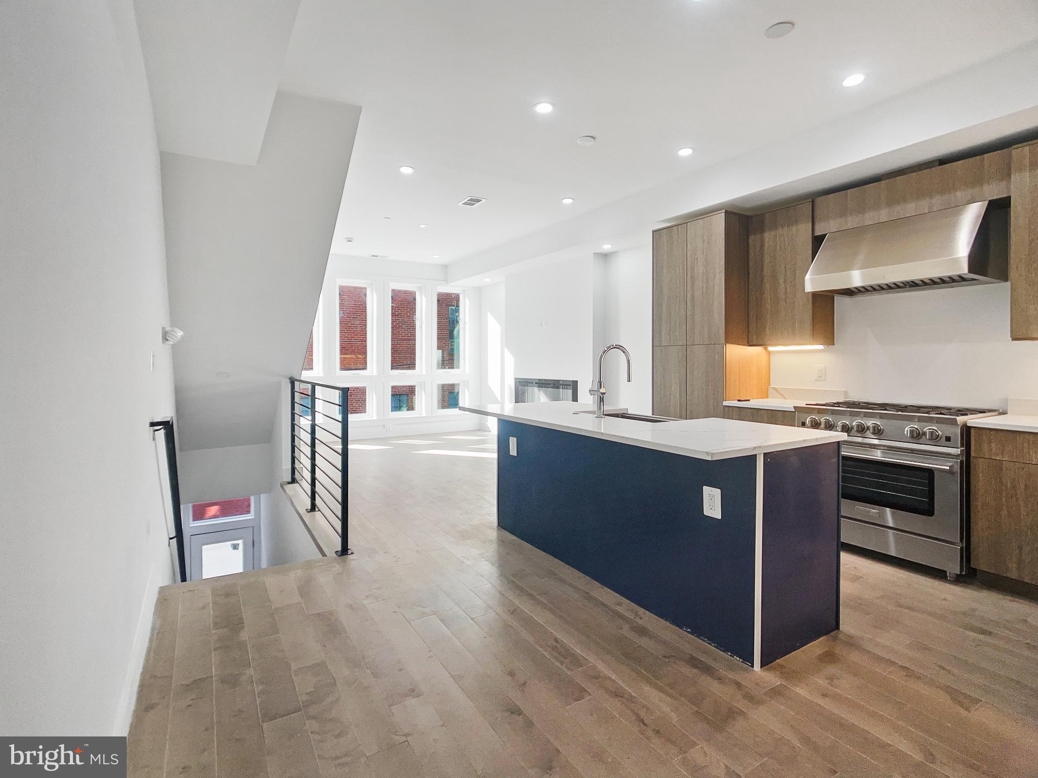 2228 13th Street Northwest, Unit 3 Washington, DC 20009 - Photo 3 of 44 Modern kitchen with sleek design and light.