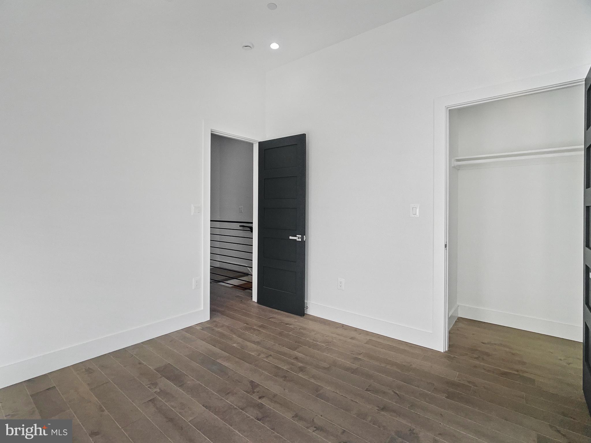 2228 13th Street Northwest, Unit 3 Washington, DC 20009 - Photo 32 of 44 Modern minimalist bedroom with sleek design.