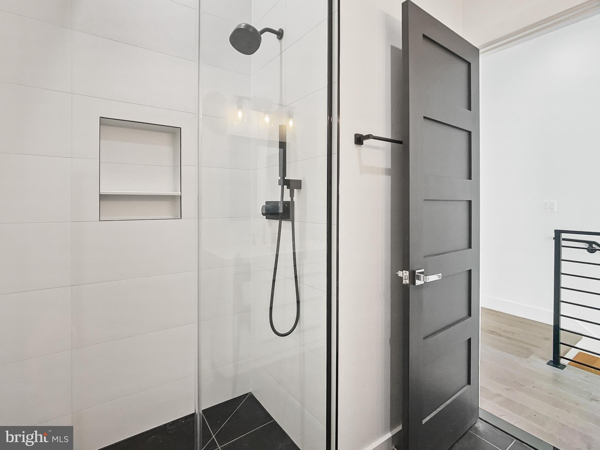 2228 13th Street Northwest, Unit 3 Washington, DC 20009 - Photo 35 of 44 Sleek modern shower with elegant design.
