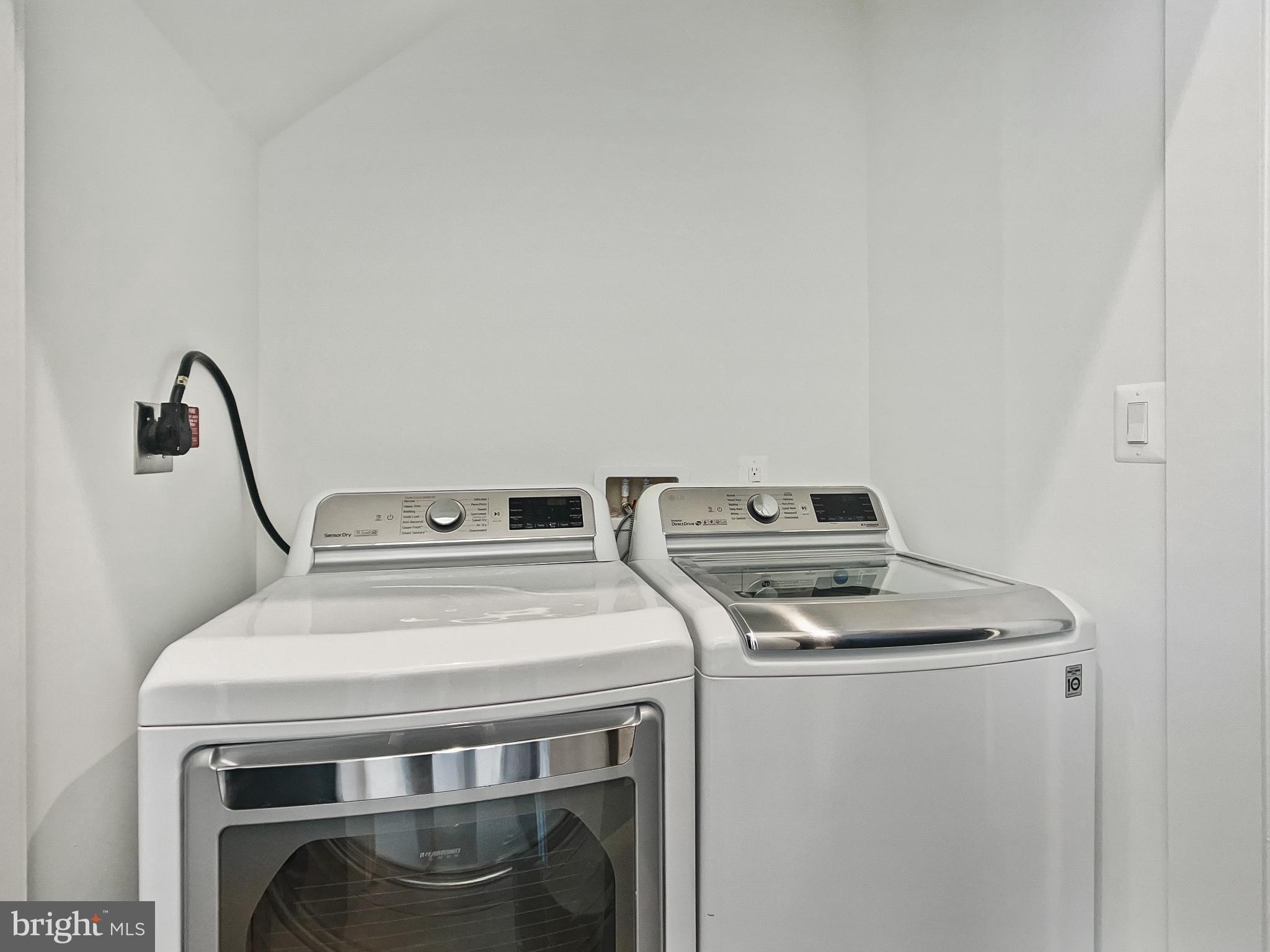 2228 13th Street Northwest, Unit 3 Washington, DC 20009 - Photo 36 of 44 Modern laundry space with sleek appliances.