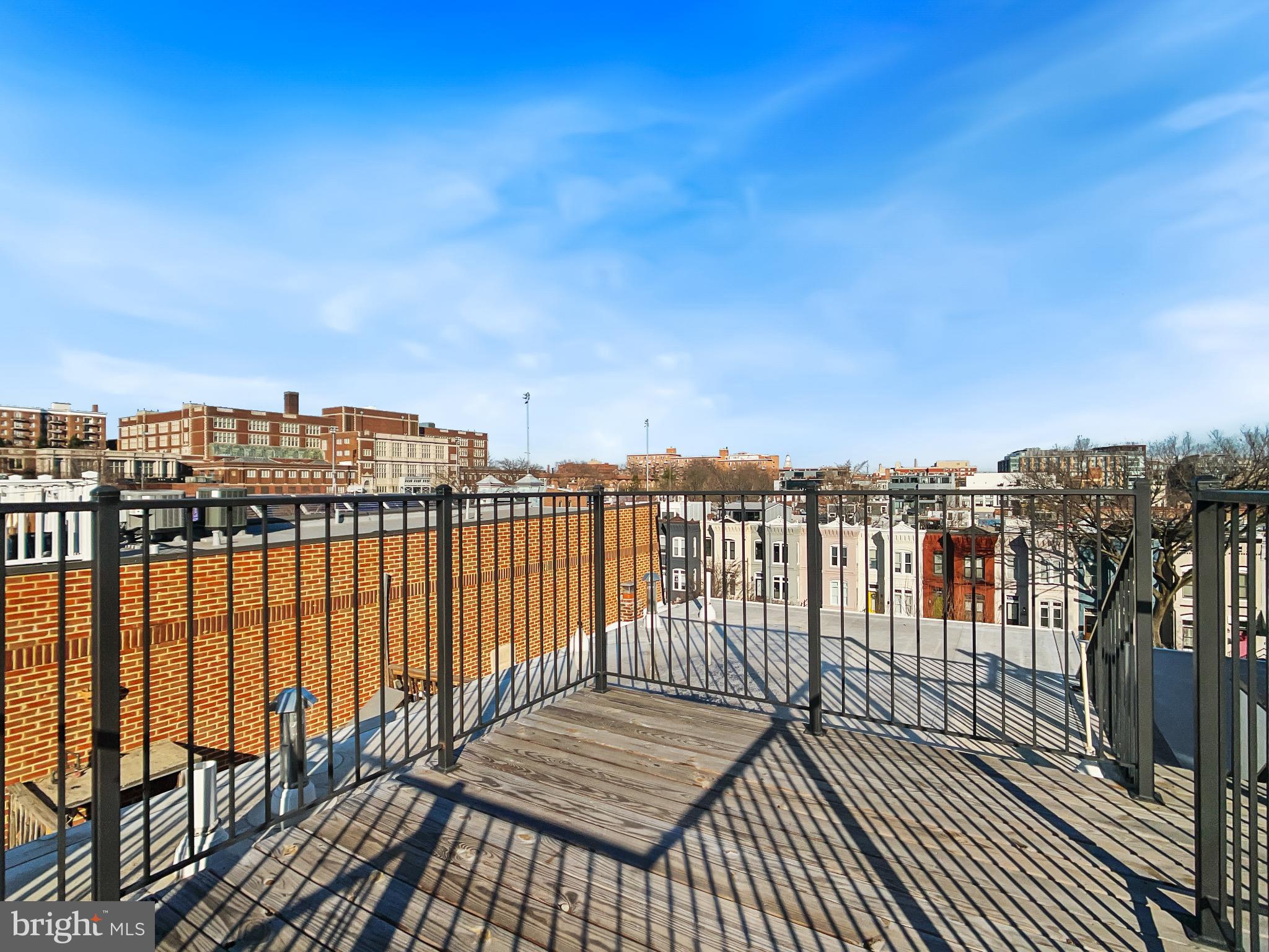 2228 13th Street Northwest, Unit 3 Washington, DC 20009 - Photo 44 of 44 Urban rooftop retreat with skyline views.