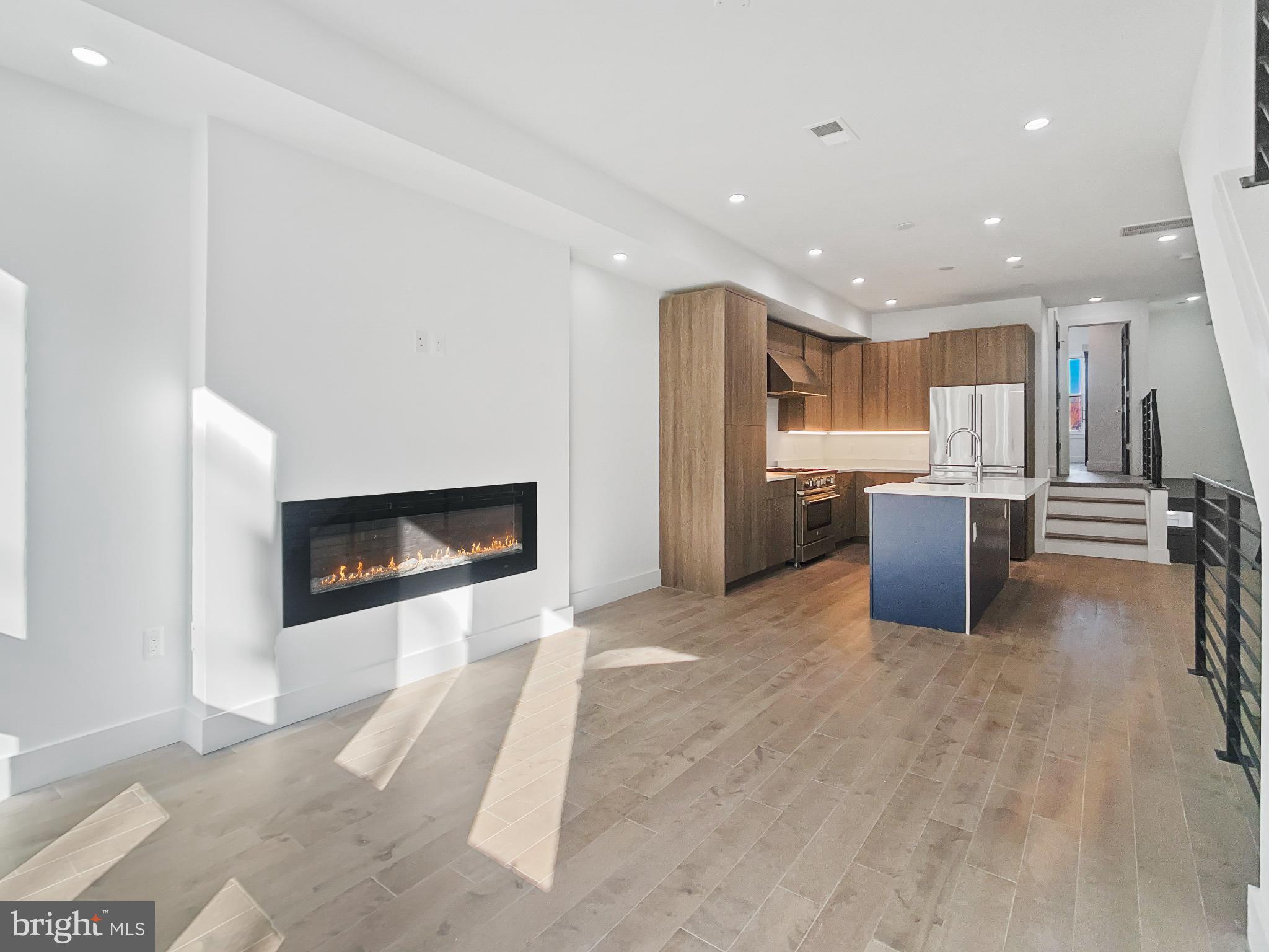 2228 13th Street Northwest, Unit 3 Washington, DC 20009 - Photo 5 of 44 Modern elegance with warm, inviting light.