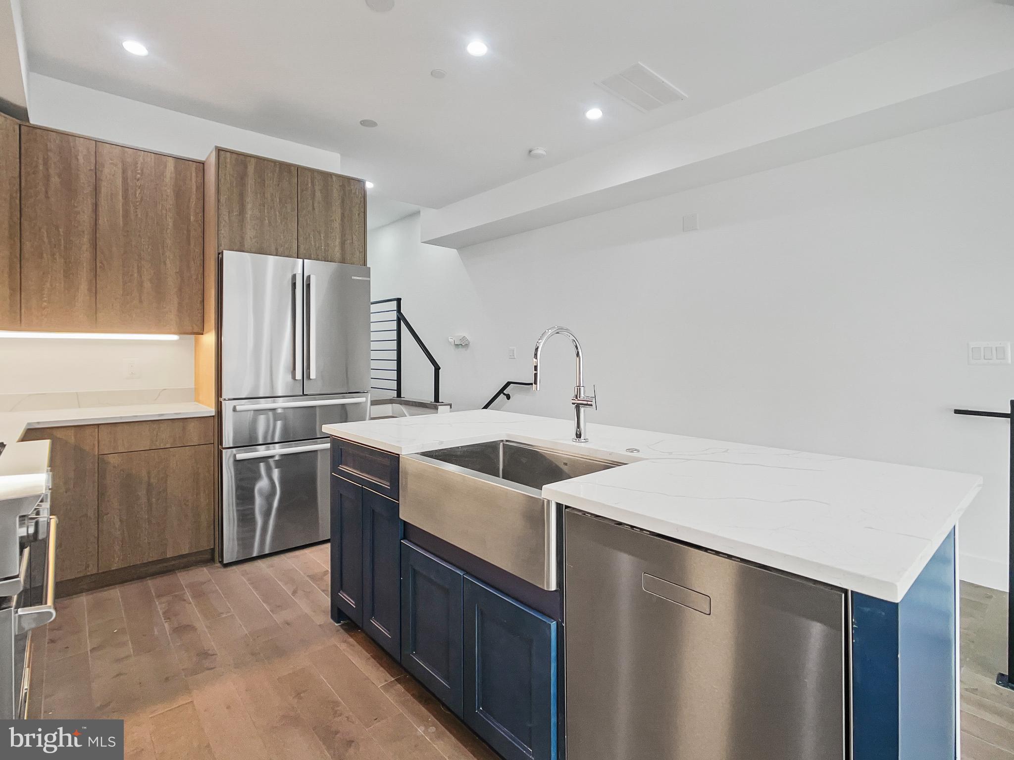 2228 13th Street Northwest, Unit 3 Washington, DC 20009 - Photo 10 of 44 Sleek modern kitchen with elegant finishes.
