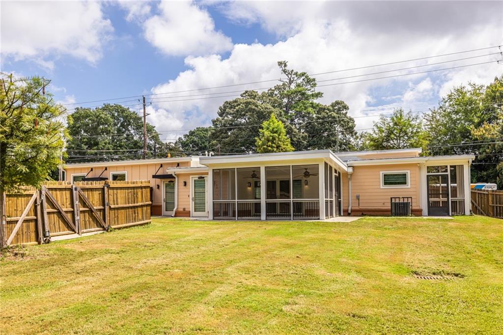 1651 Pryor Road Southwest Atlanta, GA 30315 - Photo 11 of 50 a view of a house with a backyard