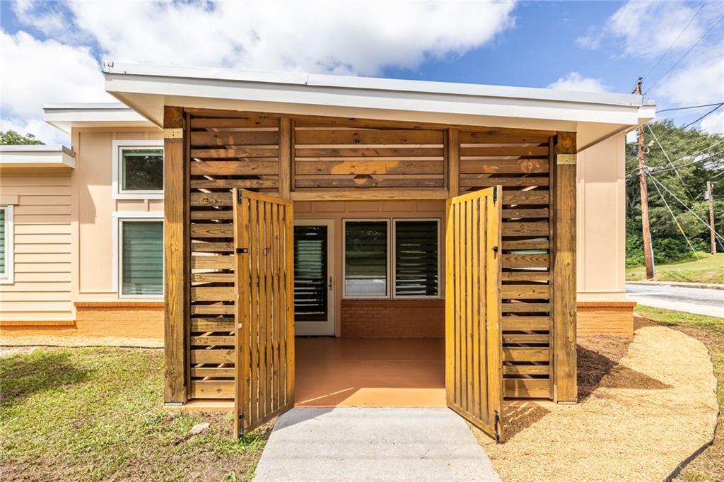 1651 Pryor Road Southwest Atlanta, GA 30315 - Photo 15 of 50 front view of a building with a outdoor space