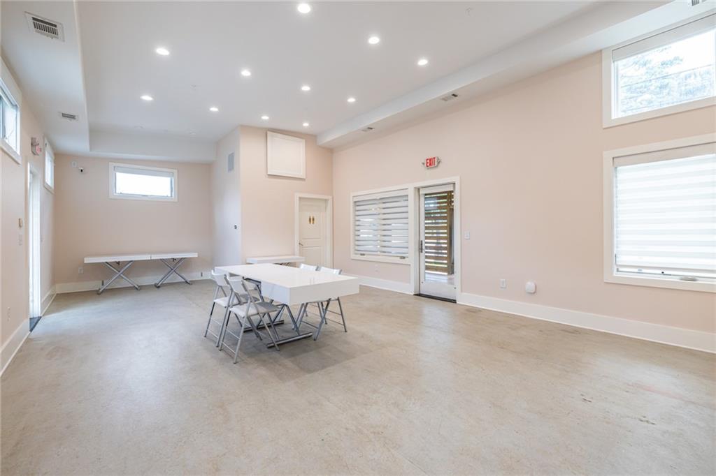 1651 Pryor Road Southwest Atlanta, GA 30315 - Photo 20 of 50 an empty room with furniture and windows