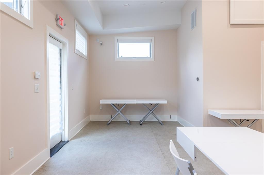 1651 Pryor Road Southwest Atlanta, GA 30315 - Photo 22 of 50 a view of room with furniture and a window