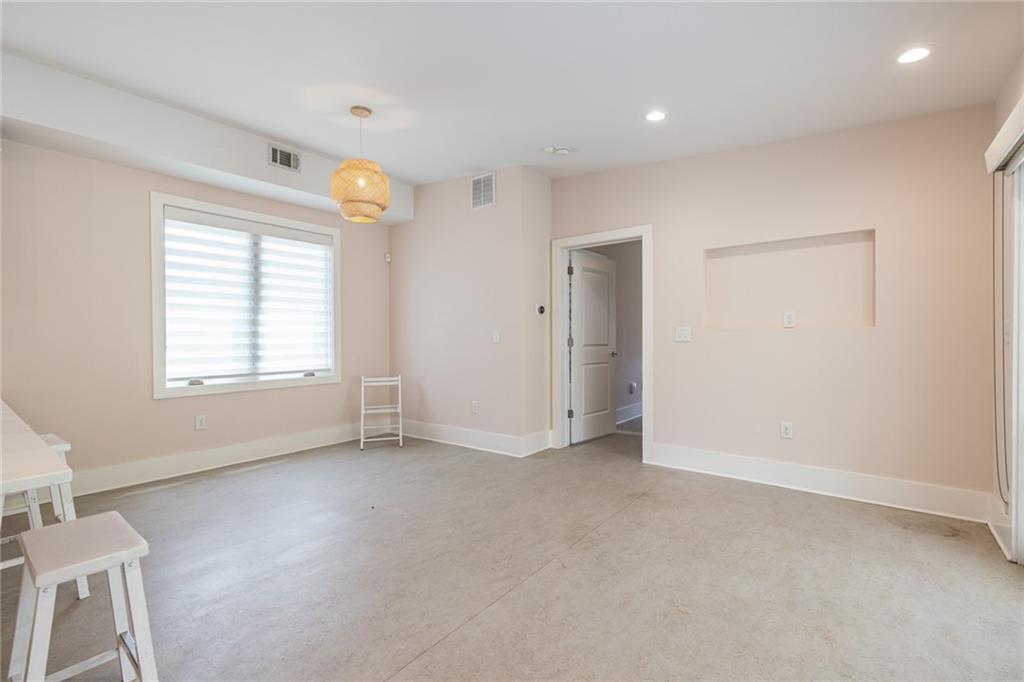 1651 Pryor Road Southwest Atlanta, GA 30315 - Photo 29 of 50 a view of an empty room with a window