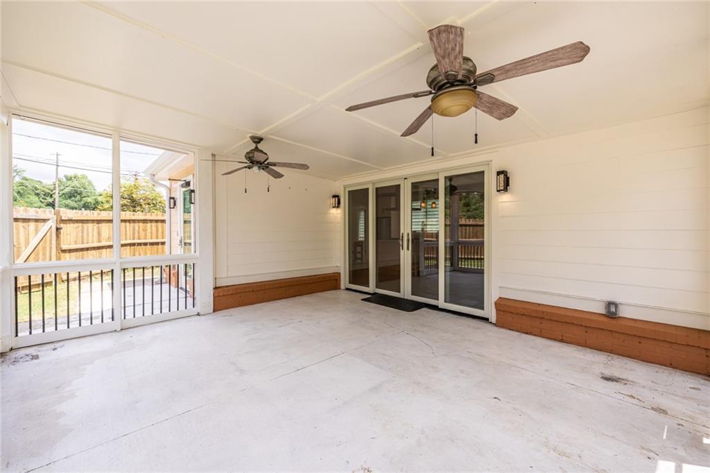 1651 Pryor Road Southwest Atlanta, GA 30315 - Photo 39 of 50 an empty room with windows and fan