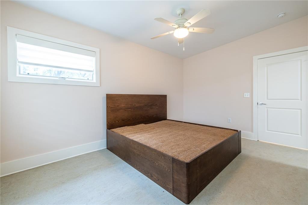 1651 Pryor Road Southwest Atlanta, GA 30315 - Photo 42 of 50 a bedroom with a bed and a window