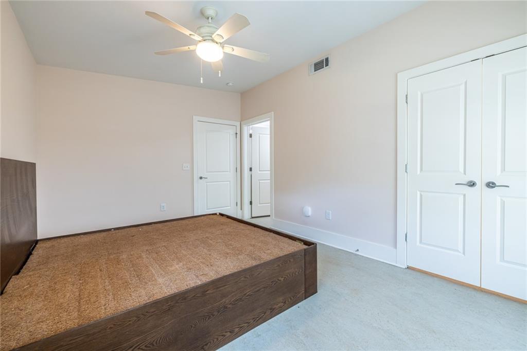 1651 Pryor Road Southwest Atlanta, GA 30315 - Photo 43 of 50 an empty room with fan and entrance