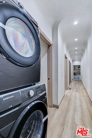 a very nice looking room with a washing machine