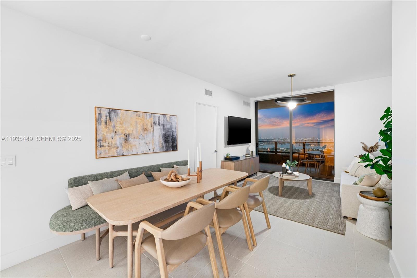 159 Northeast 6th Street, Unit 4415 Miami, FL 33132 - Photo 27 of 47 a view of a dining room with furniture