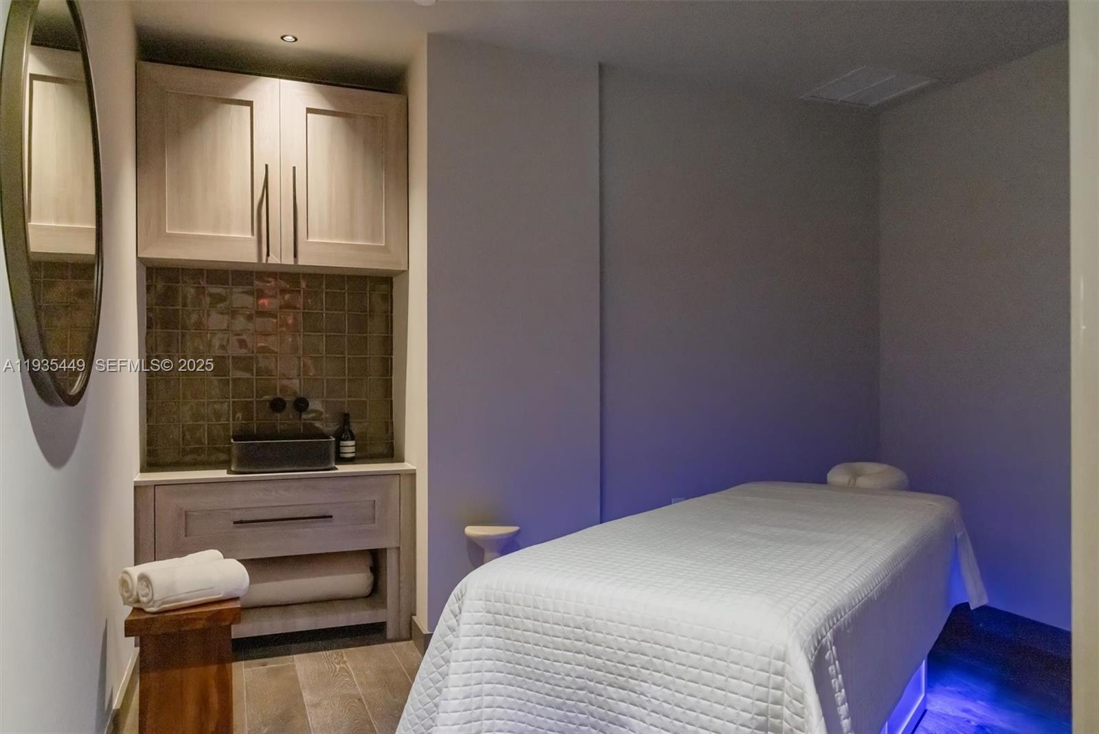 159 Northeast 6th Street, Unit 4415 Miami, FL 33132 - Photo 39 of 47 a bedroom with a bed and a window