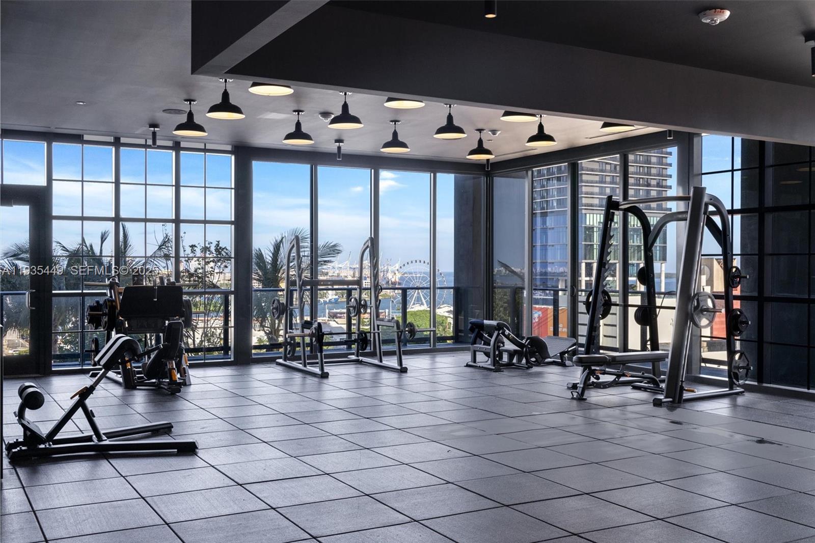 159 Northeast 6th Street, Unit 4415 Miami, FL 33132 - Photo 41 of 47 a view of a room with gym equipment