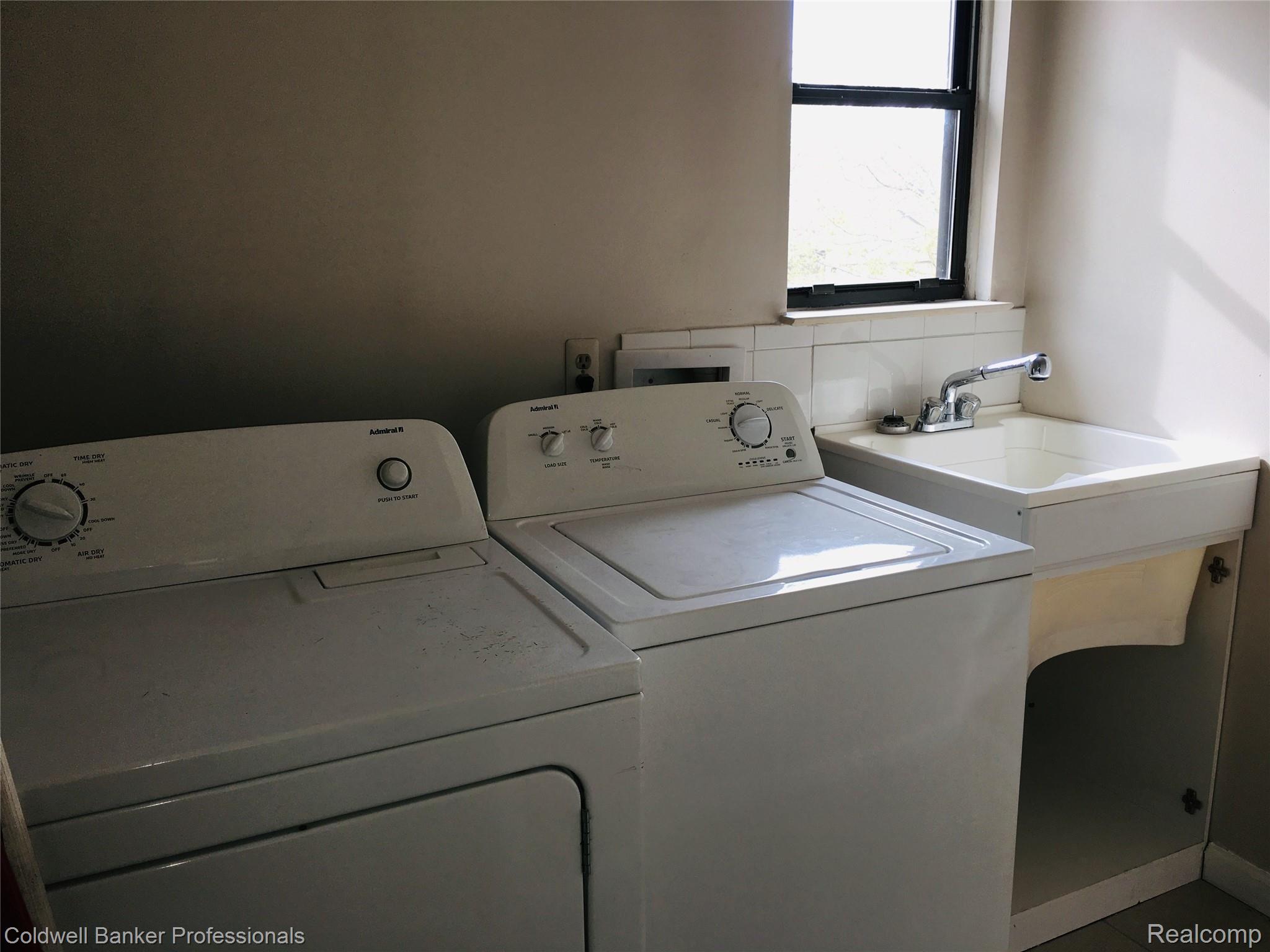 676 Tennyson, Unit 13 Rochester, MI 48307 - Photo 14 of 22 Upstairs laundry includes appliances