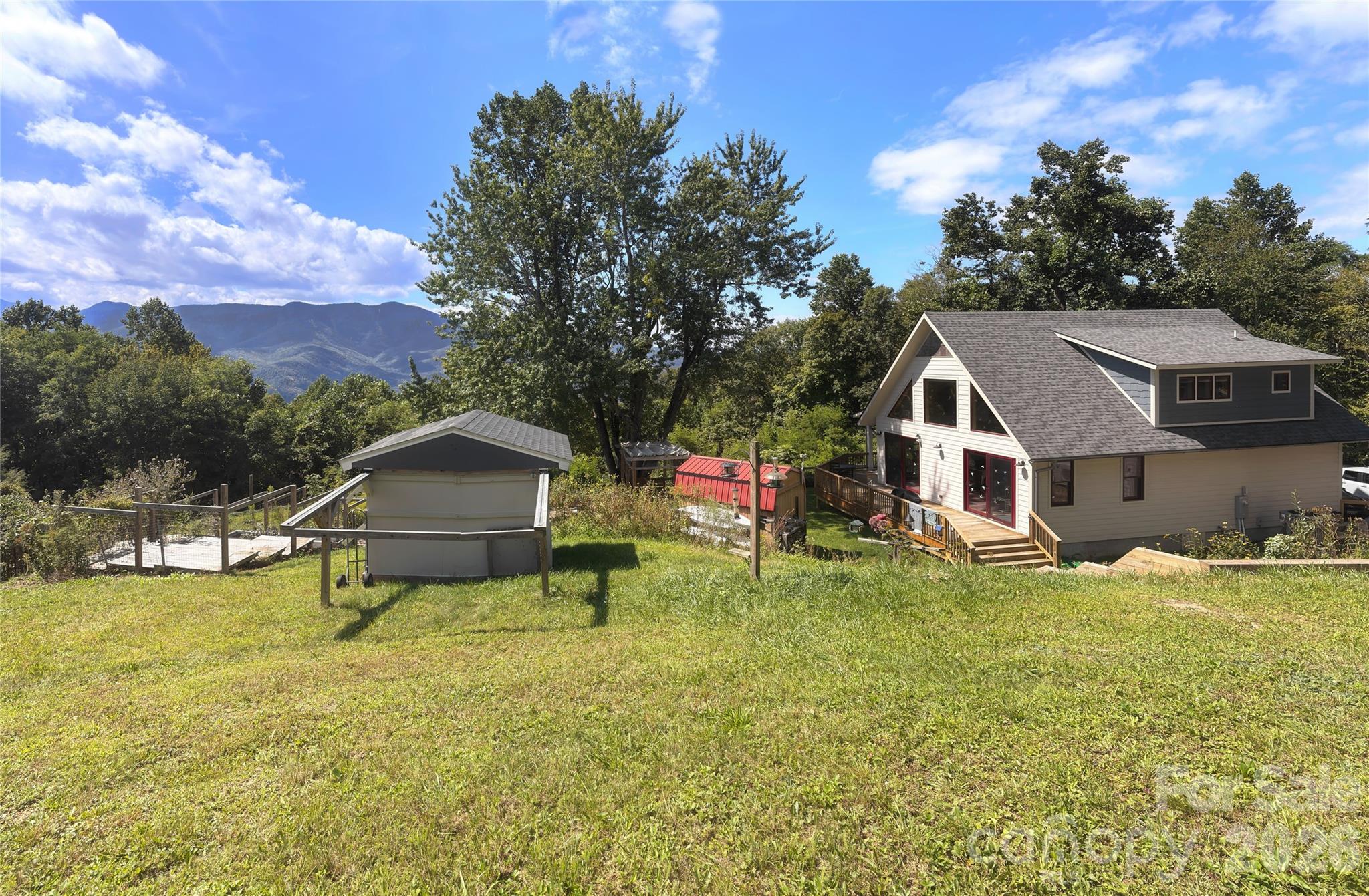 1856 Cabbage Patch Road Burnsville, NC 28714 - Photo 4 of 46 a house view with a outdoor space