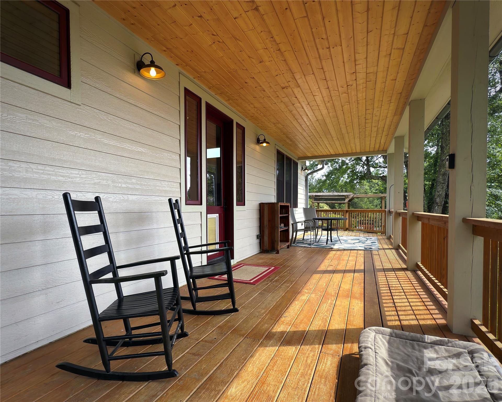 1856 Cabbage Patch Road Burnsville, NC 28714 - Photo 9 of 46 a view of balcony with wooden floor and outdoor seating