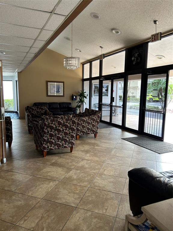 6770 Royal Palm Boulevard, Unit 301L Margate, FL 33063 - Photo 20 of 32 a living room with furniture