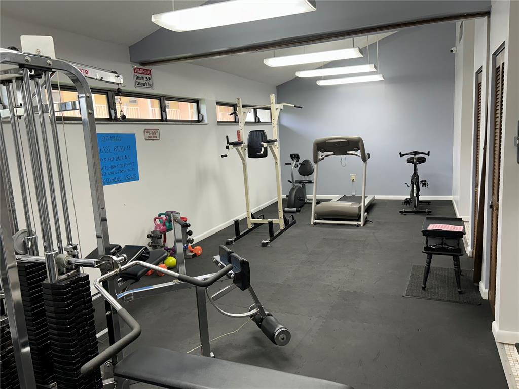 6770 Royal Palm Boulevard, Unit 301L Margate, FL 33063 - Photo 23 of 32 a room with gym equipment