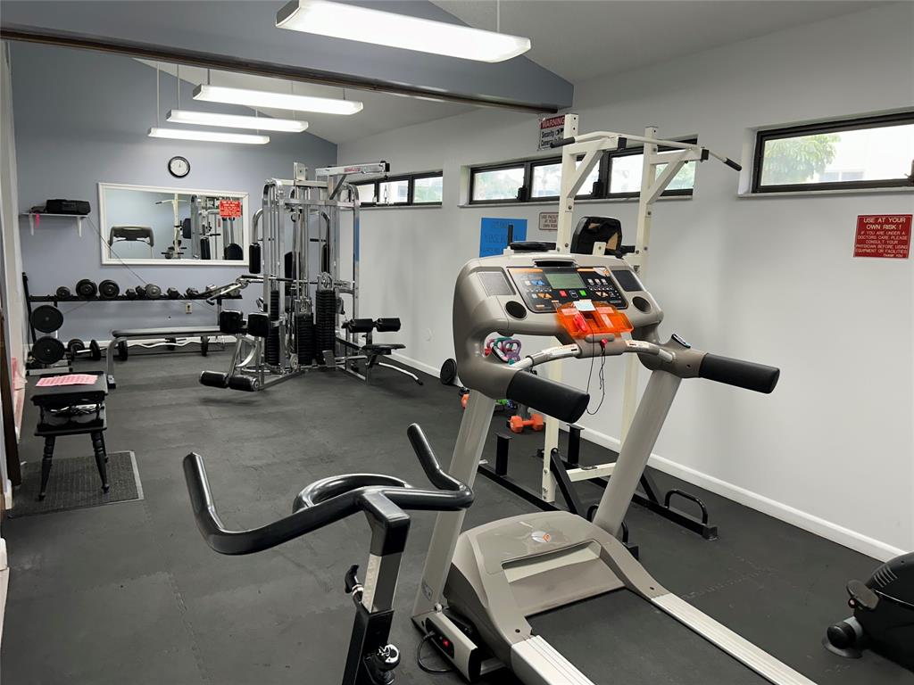 6770 Royal Palm Boulevard, Unit 301L Margate, FL 33063 - Photo 24 of 32 a view of a room with gym equipment
