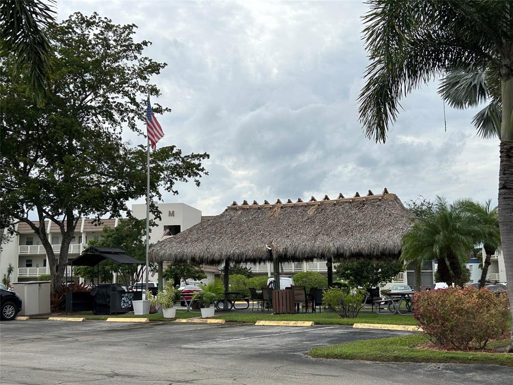 6770 Royal Palm Boulevard, Unit 301L Margate, FL 33063 - Photo 29 of 32 a view of a town with palm trees