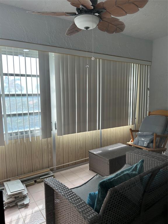 6770 Royal Palm Boulevard, Unit 301L Margate, FL 33063 - Photo 7 of 32 a living room with furniture and a window