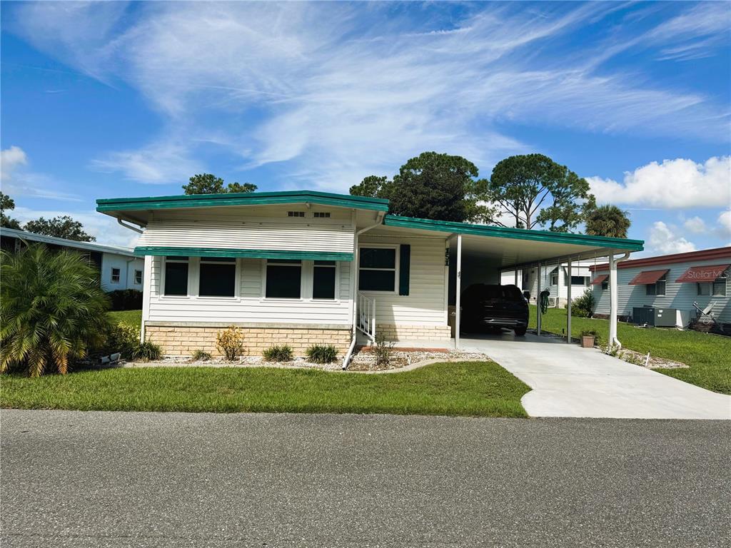 front view of house with a yard