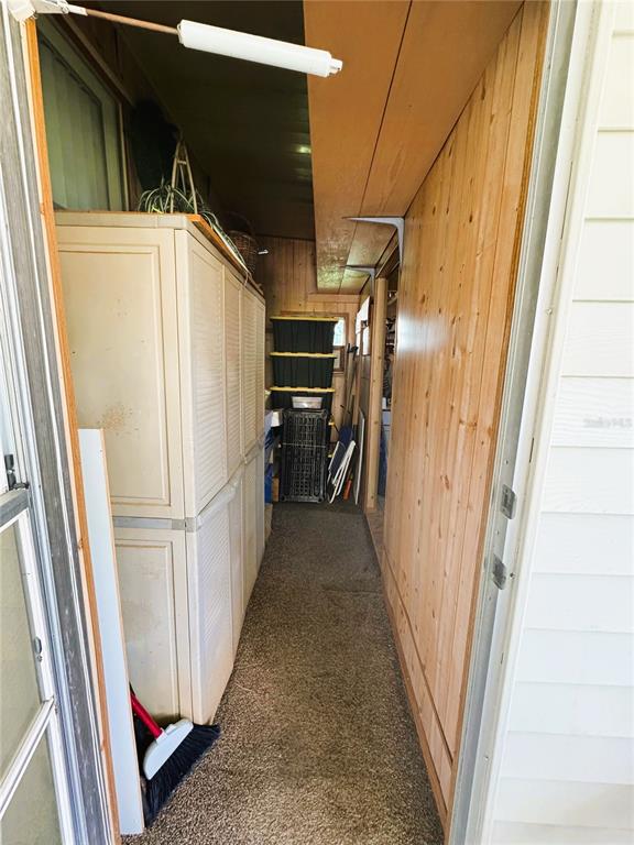 151 Hibiscus Way Leesburg, FL 34748 - Photo 28 of 30 a view of a refrigerator and an entryway
