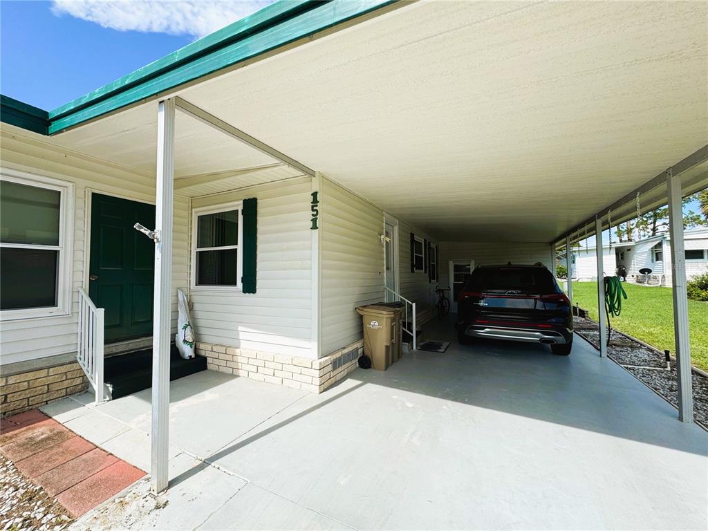 151 Hibiscus Way Leesburg, FL 34748 - Photo 4 of 30 a car parked in front of house