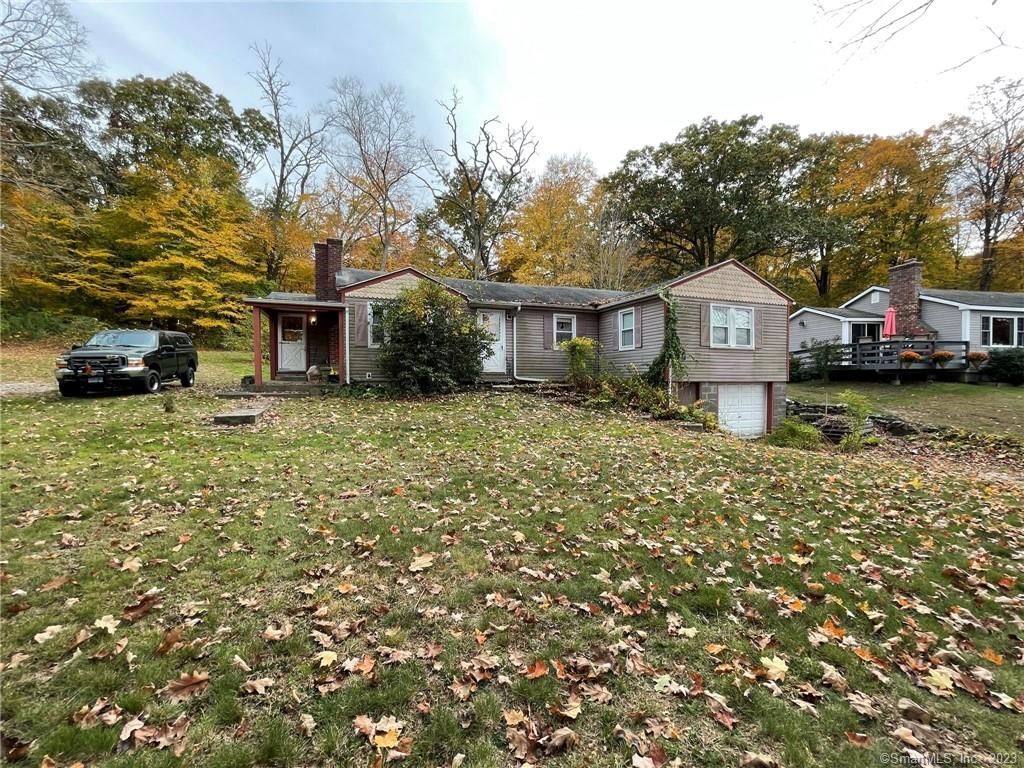 413 Pond Road North Franklin, CT 06254 - Photo 1 of 28 front view of a house with a yard