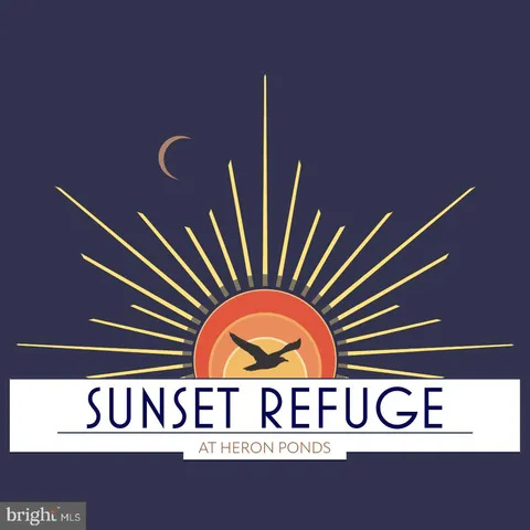 a view of lake with green space