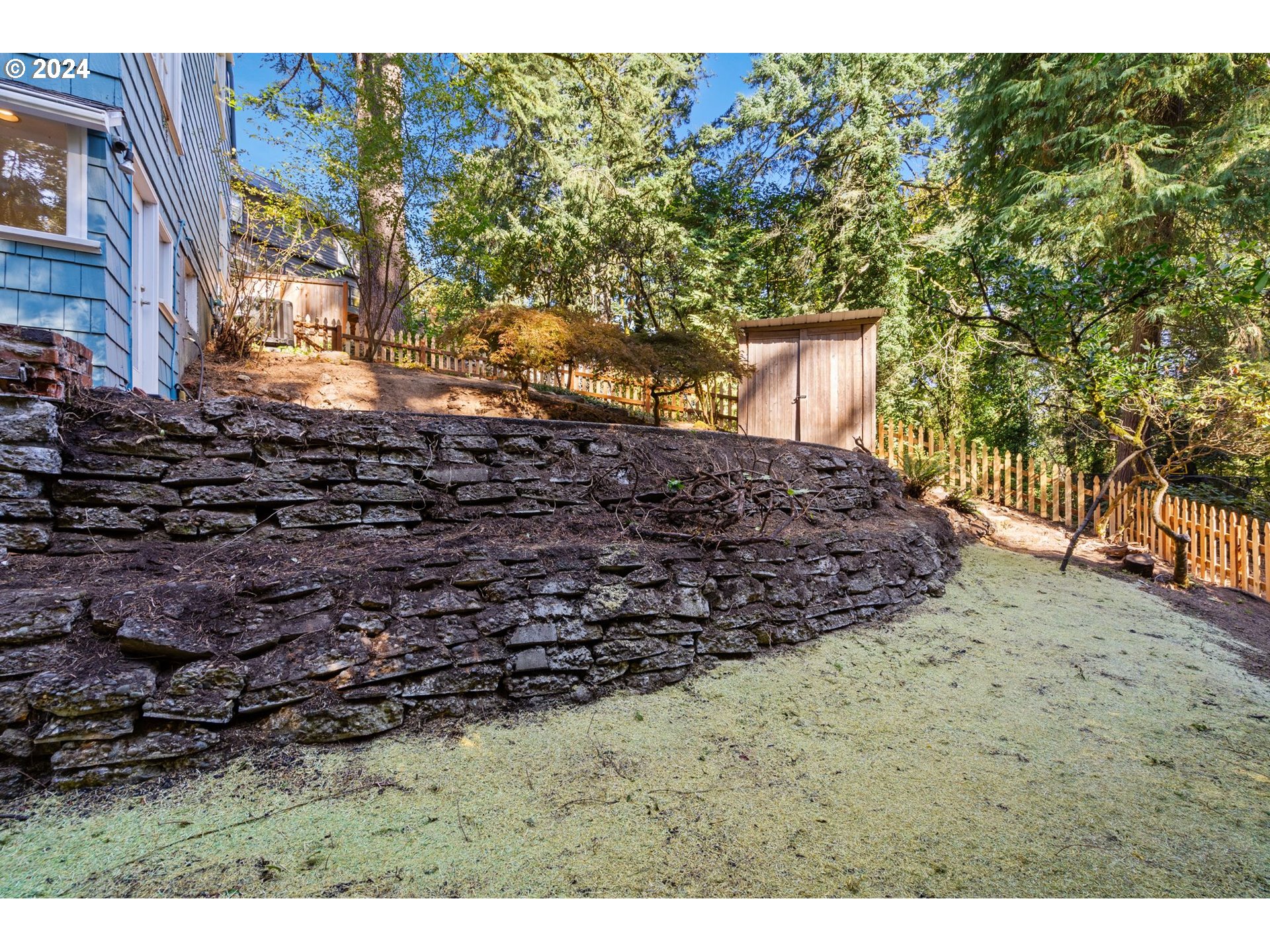 2770 Southwest Talbot Road Portland, OR 97201 - Photo 41 of 45 a view of a house with a yard