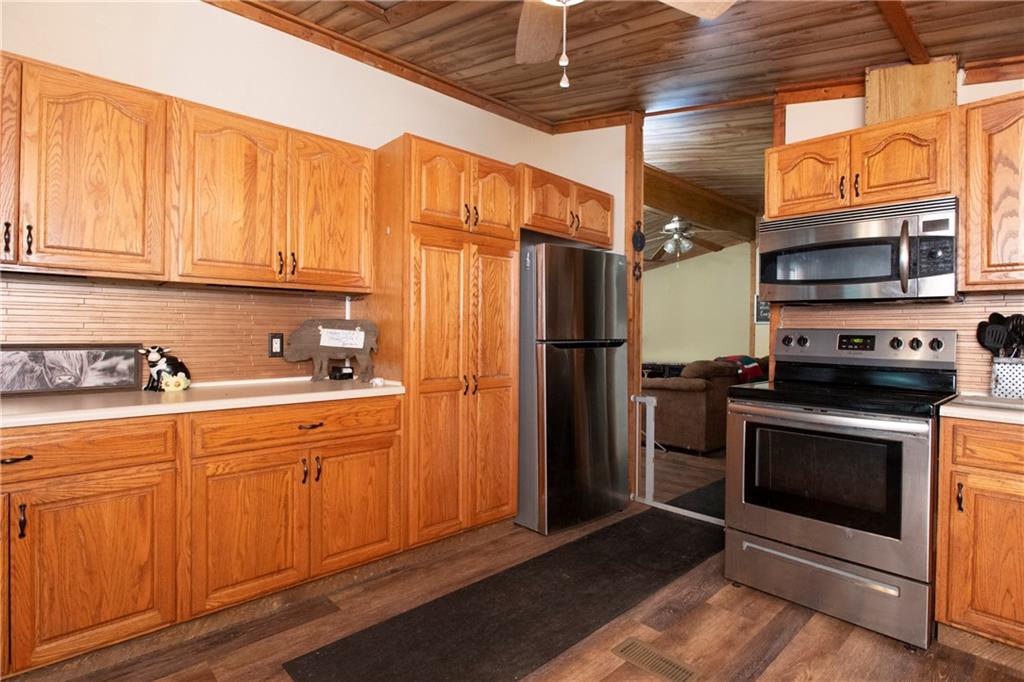 9133 South Watson Run Road Meadville, PA 16335 - Photo 10 of 45 a kitchen with stainless steel appliances granite countertop a refrigerator stove and sink