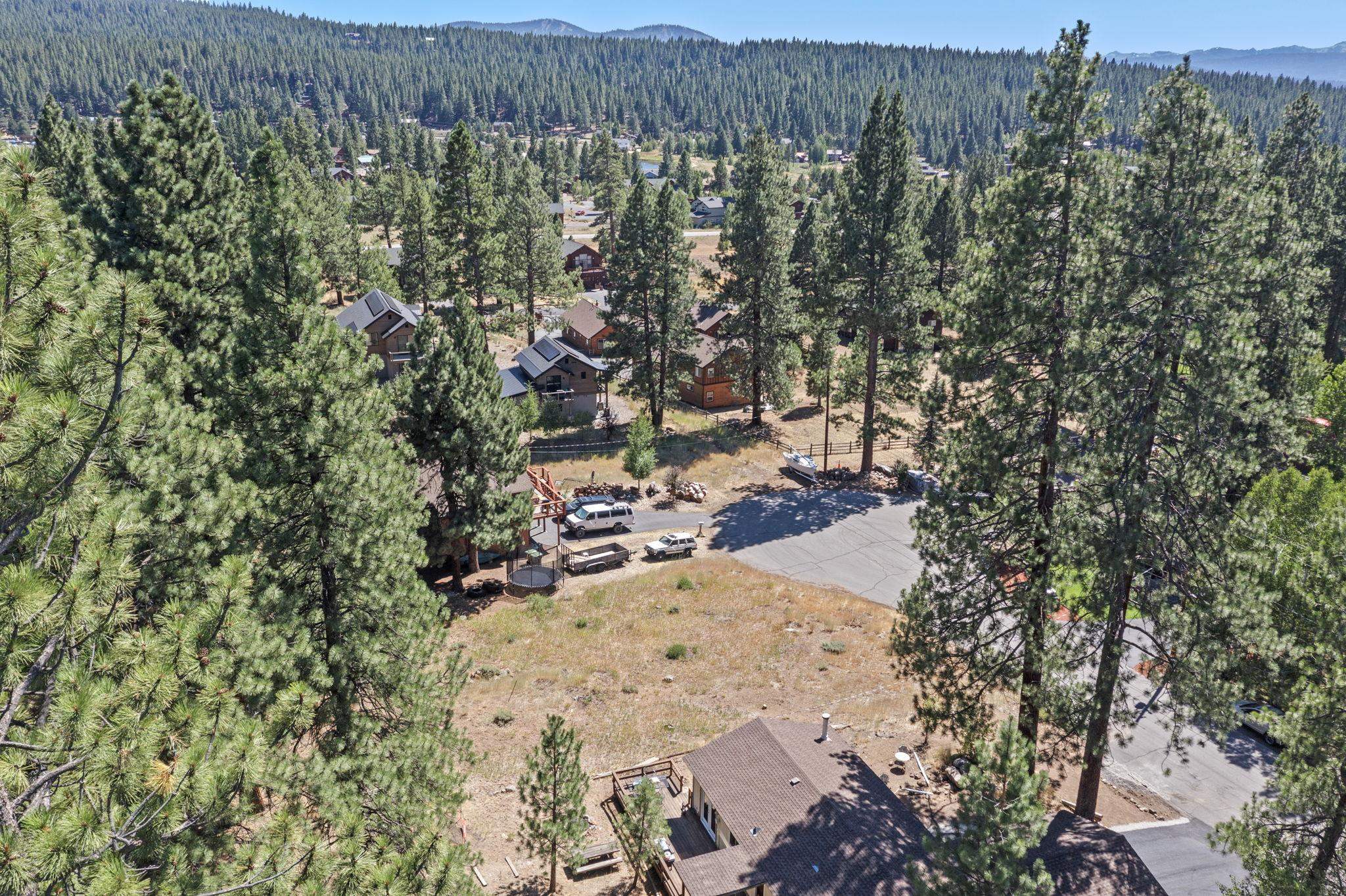 10583 Laburnham Circle Truckee, CA 96161 - Photo 8 of 14 an aerial view of a house with a yard and mountain view in back