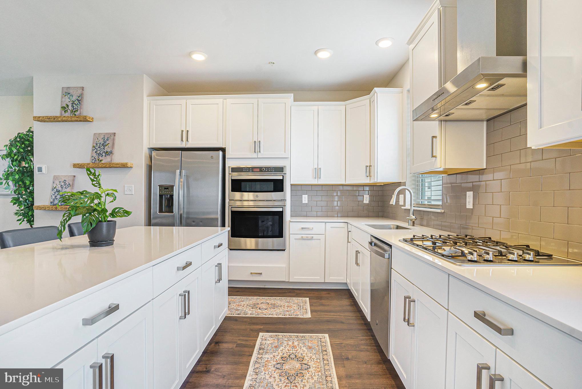 218 Red Leaf Lane Exton, PA 19341 - Photo 12 of 29 a kitchen with cabinets and stainless steel appliances