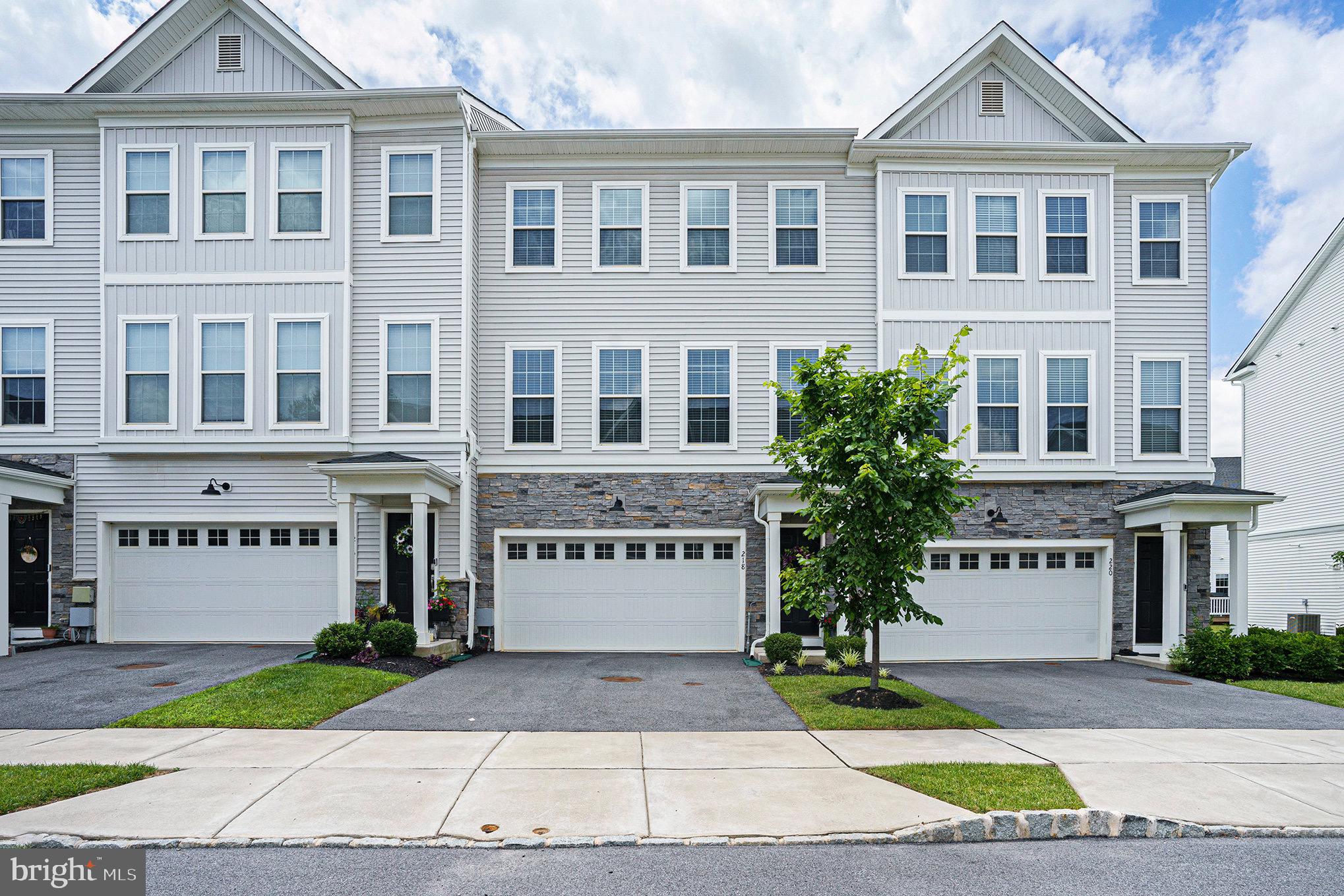 218 Red Leaf Lane Exton, PA 19341 - Photo 2 of 29 a view of a building next to a yard