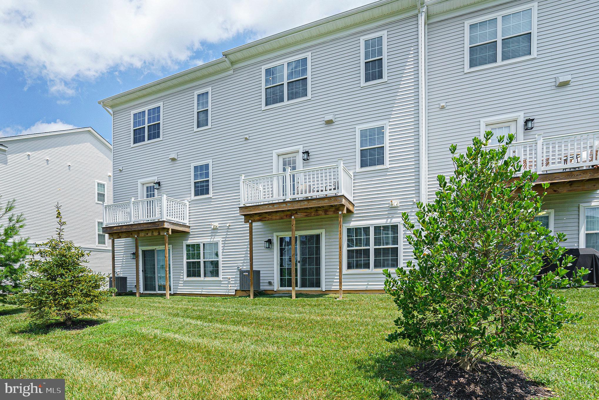 218 Red Leaf Lane Exton, PA 19341 - Photo 3 of 29 a front view of a house with a garden