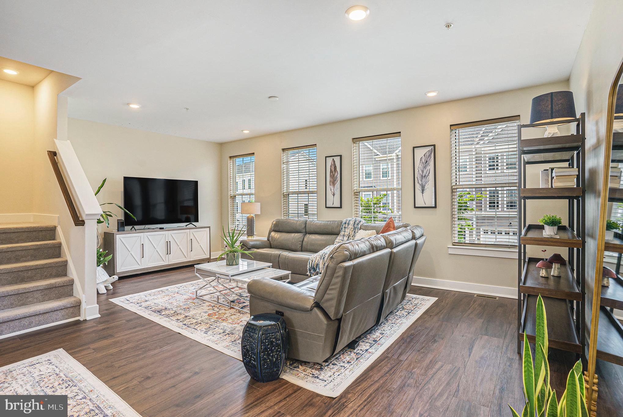 218 Red Leaf Lane Exton, PA 19341 - Photo 4 of 29 a living room with furniture and a flat screen tv