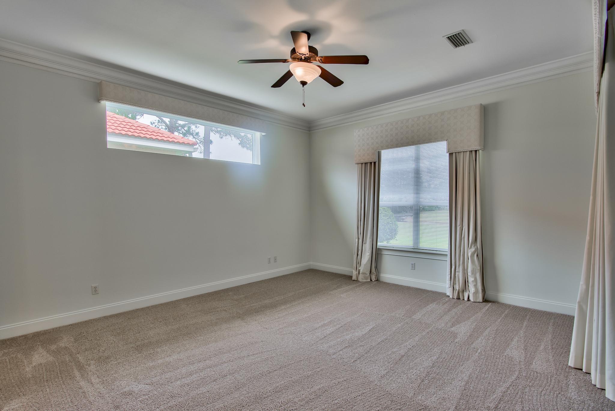 359 Indigo Loop Miramar Beach, FL 32550 - Photo 20 of 47 wooden floor in an empty room with a window