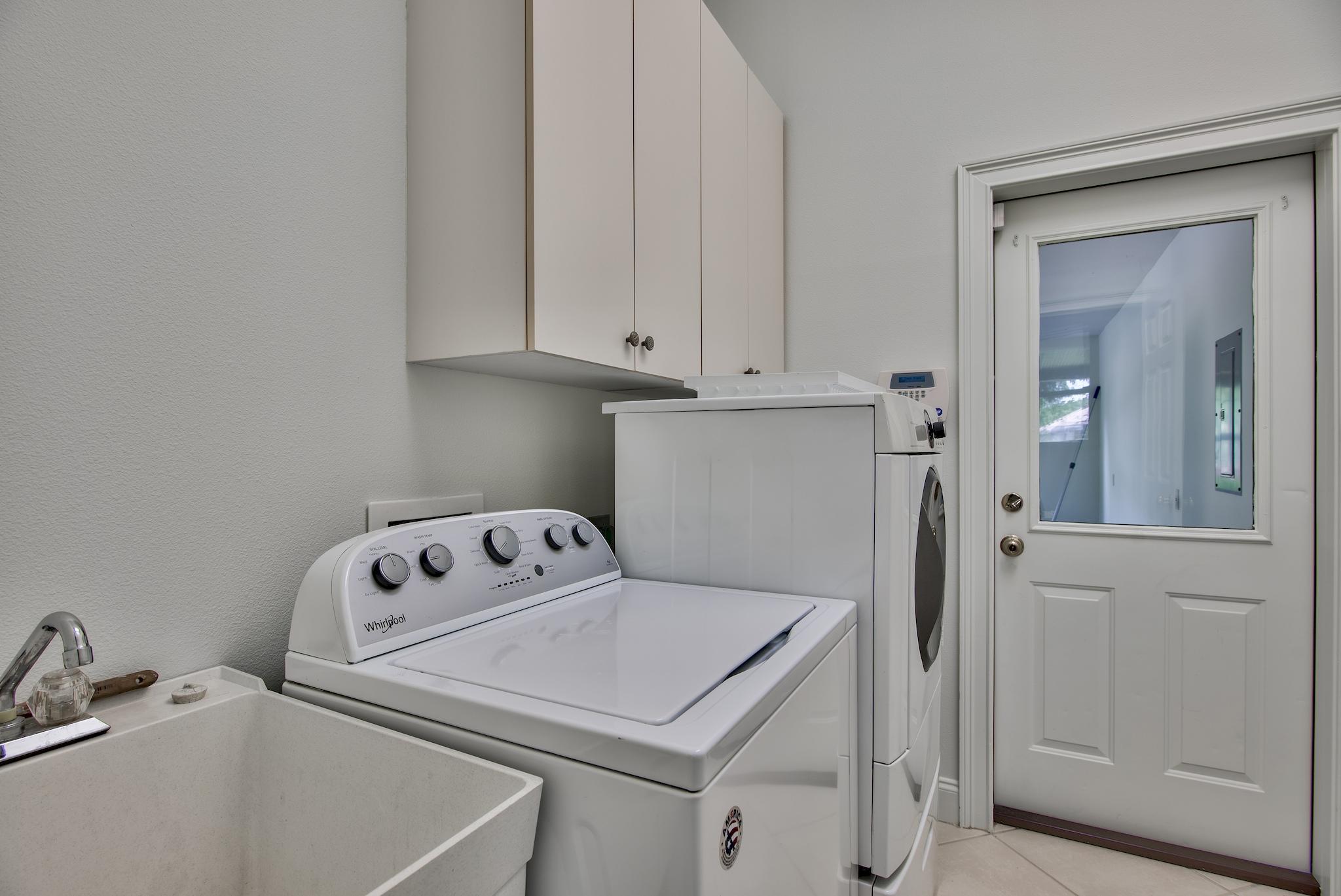 359 Indigo Loop Miramar Beach, FL 32550 - Photo 30 of 47 a utility room with dryer and washer