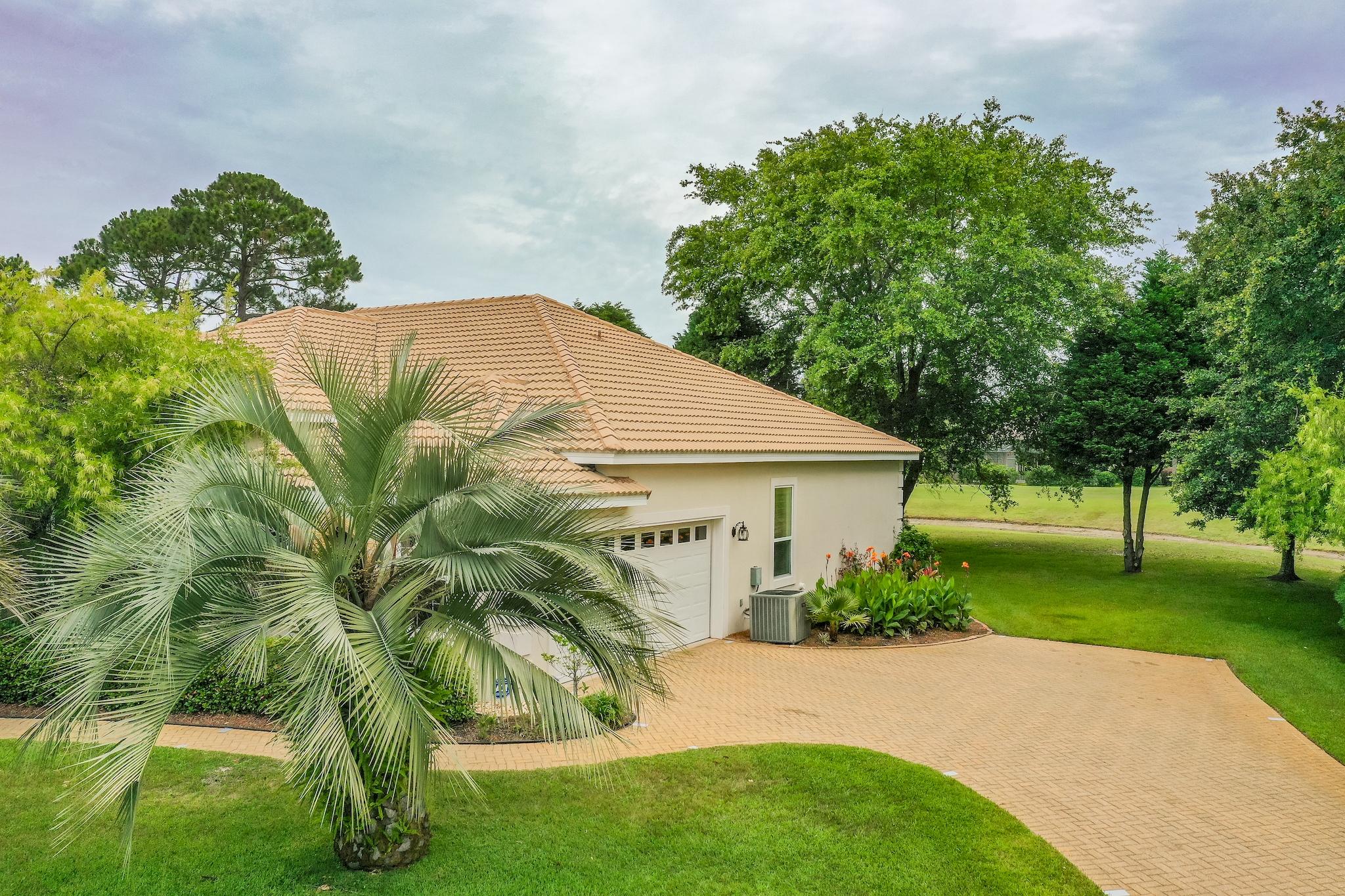359 Indigo Loop Miramar Beach, FL 32550 - Photo 32 of 47 a view of a house with a yard
