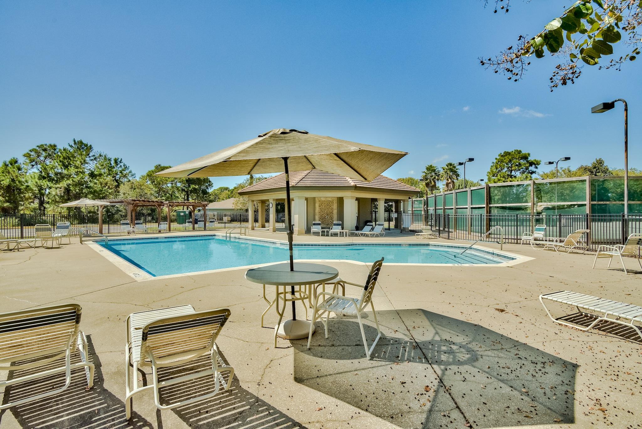 359 Indigo Loop Miramar Beach, FL 32550 - Photo 38 of 47 a view of a swimming pool with a lounge chair