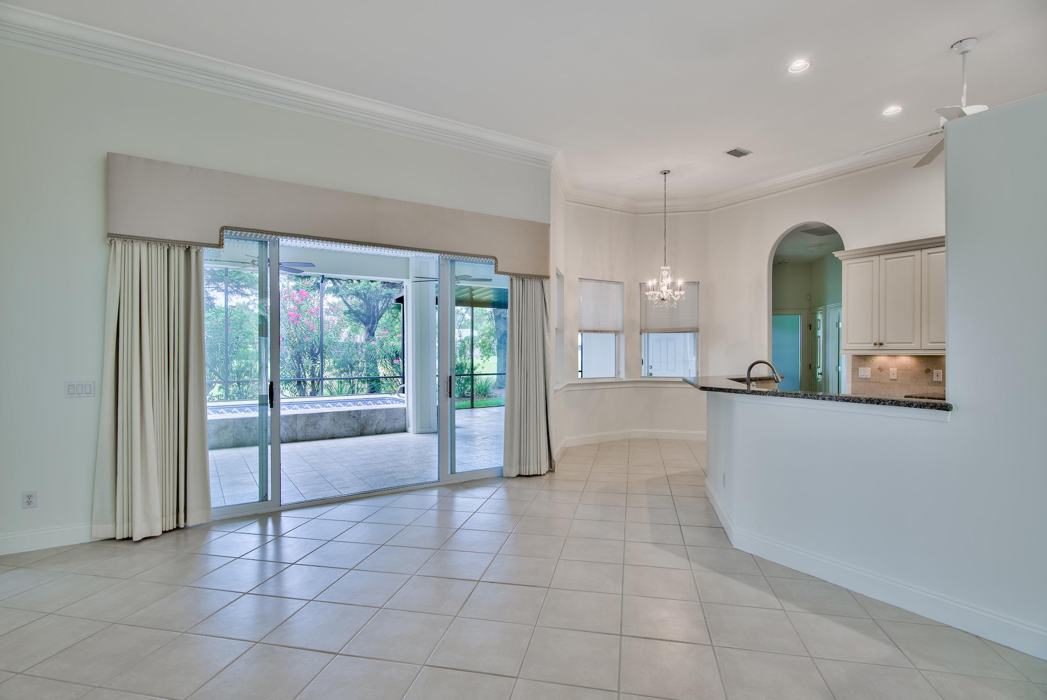 359 Indigo Loop Miramar Beach, FL 32550 - Photo 6 of 47 a view of a big room with windows and chandelier