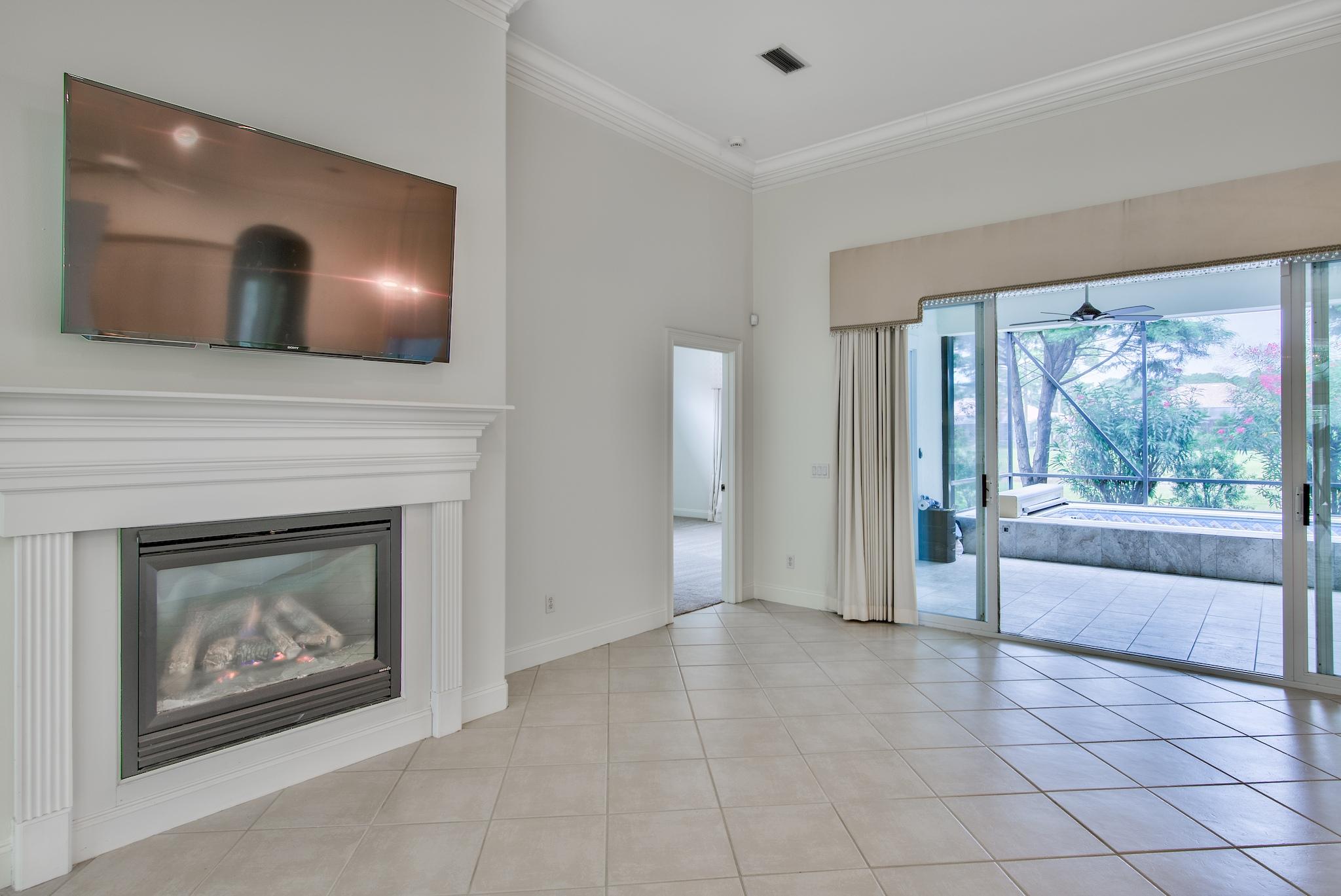 359 Indigo Loop Miramar Beach, FL 32550 - Photo 7 of 47 a living room with furniture and a fireplace