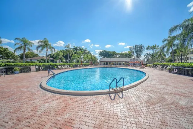 a view of a swimming pool with outdoor space